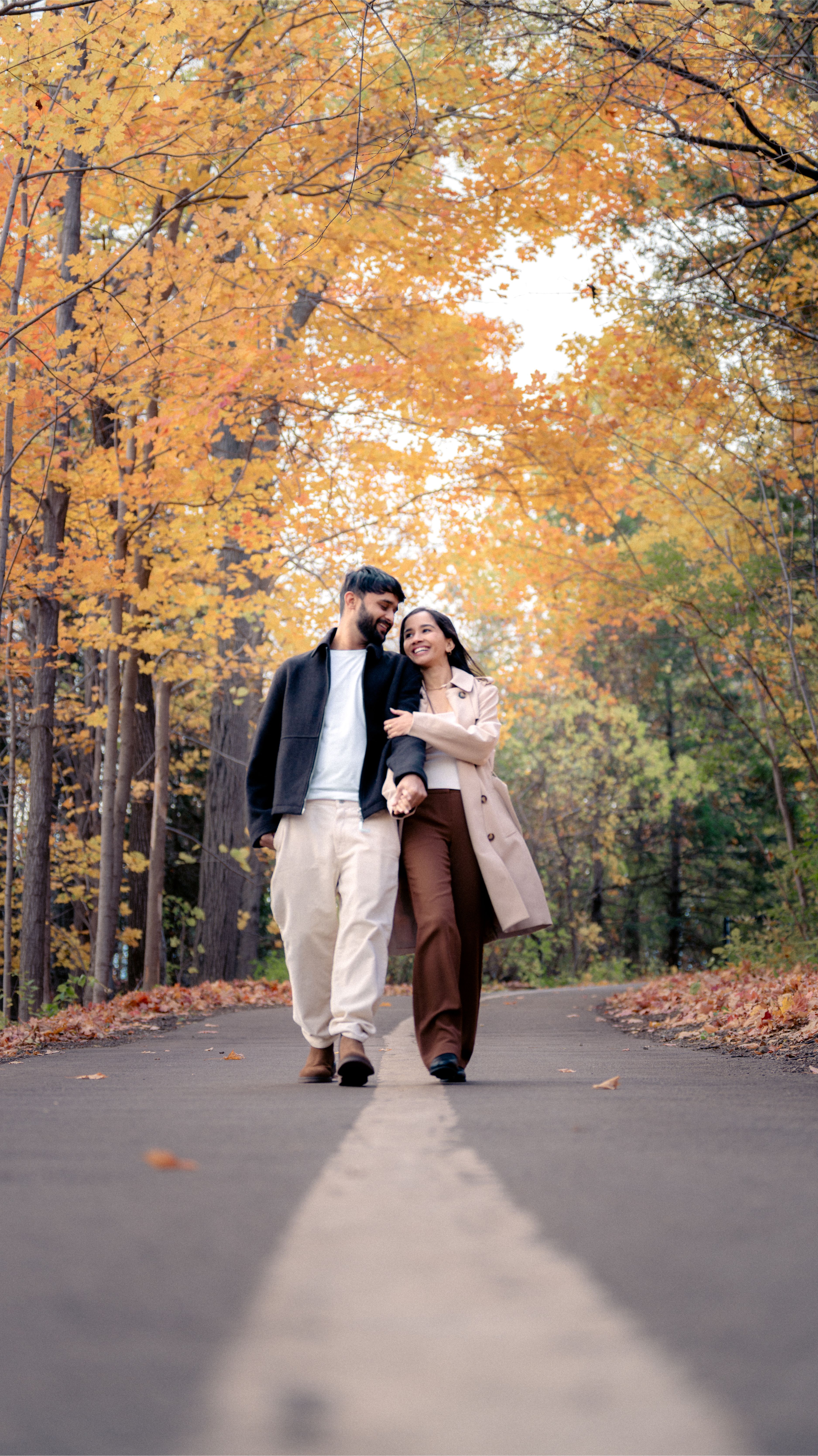 Couple walking during a fall engagement session